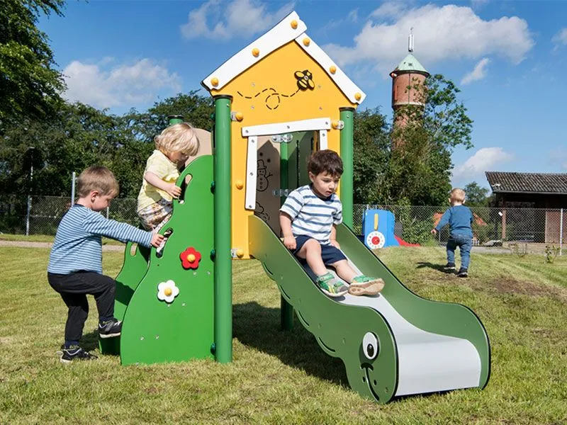 Miniplay Anne with happy children on the playground Miniplay Anne with happy children on the playground